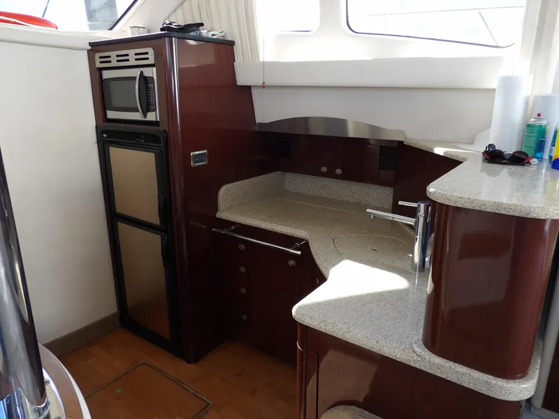 Slide: The Image of Luxurious kitchen area in 2008 Sea Ray 44 Sedan Bridge yacht. - 27