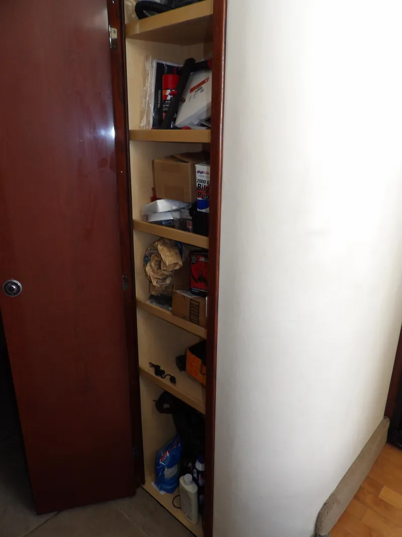 Slide: The Image of Storage shelves inside 2008 Sea Ray 44 Sedan Bridge yacht. - 39
