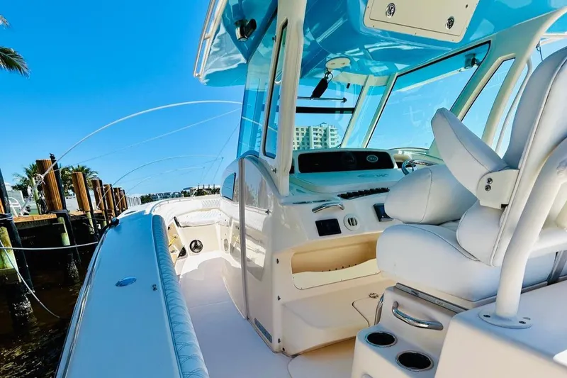 Slide: The Image of 2012 Grady-White Canyon 366 boat interior with helm and seating. - 22