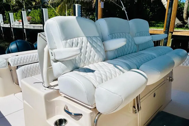 Slide: The Image of Luxurious seating on 2012 Grady-White Canyon 366 boat with quilted upholstery. - 29