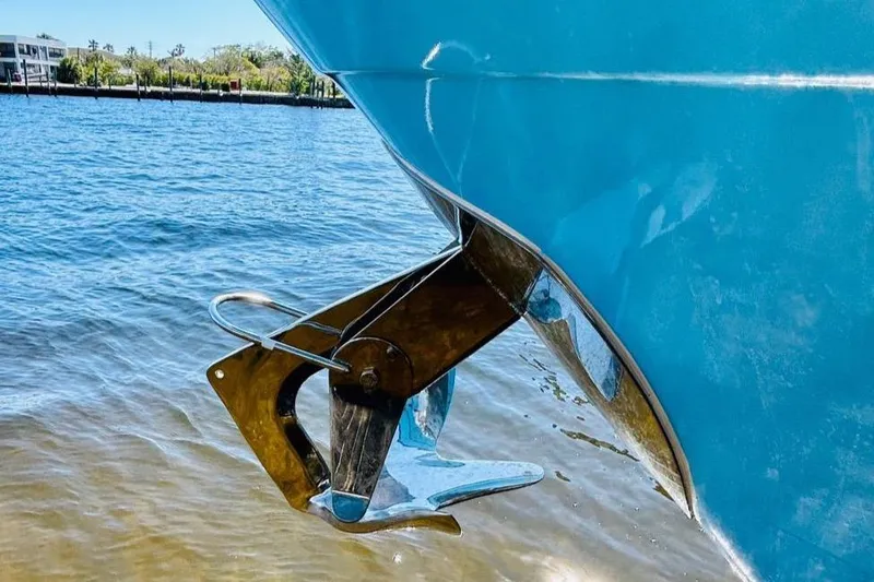Slide: The Image of 2012 Grady-White Canyon 366 boat anchor in clear water. - 3