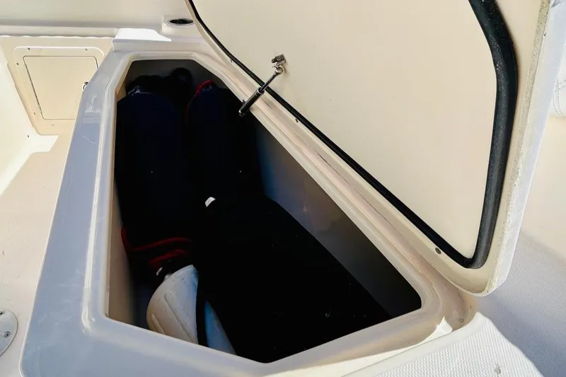Slide: The Image of Open storage compartment on 2012 Grady-White Canyon 366 boat. - 38