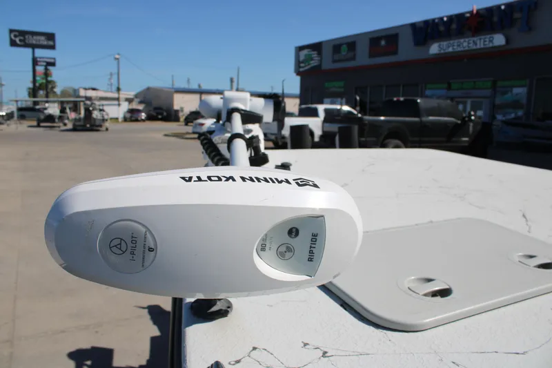 Slide: The Image of Minn Kota Riptide motor on 2015 Shoalwater 20 Catamaran at dealership. - 17