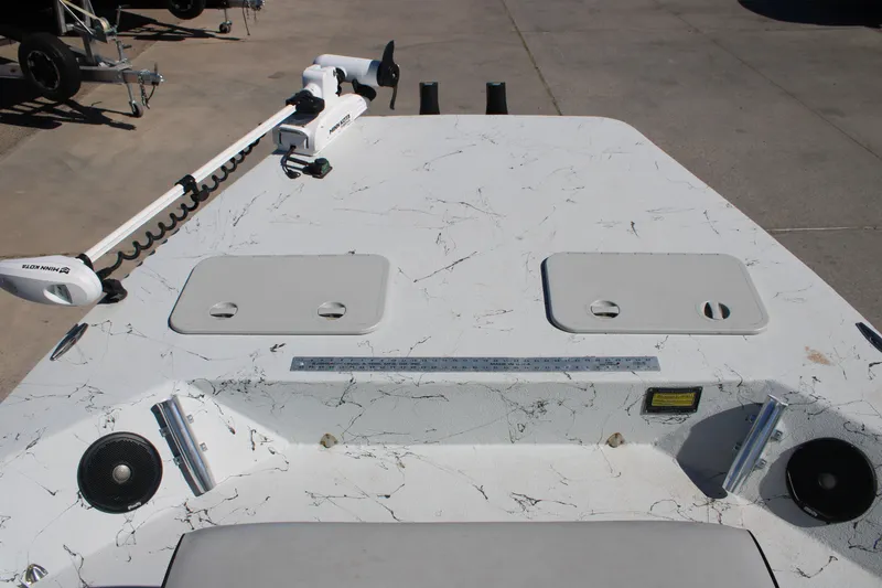 Slide: The Image of 2015 Shoalwater 20 Catamaran deck with trolling motor and storage compartments. - 5