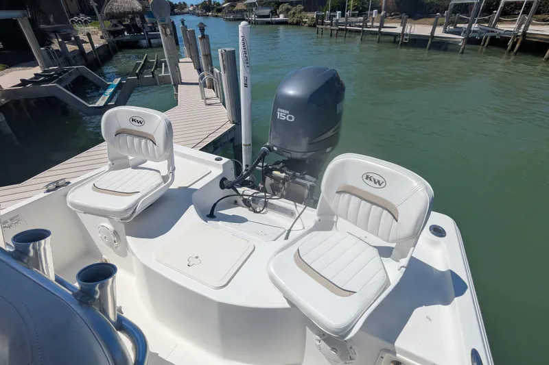 Slide: The Image of 2012 Key West 216 Bay Reef boat with Yamaha 150 engine at dock. - 8