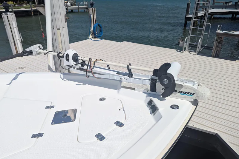 Slide: The Image of 2012 Key West 216 Bay Reef boat with trolling motor at dockside. - 9