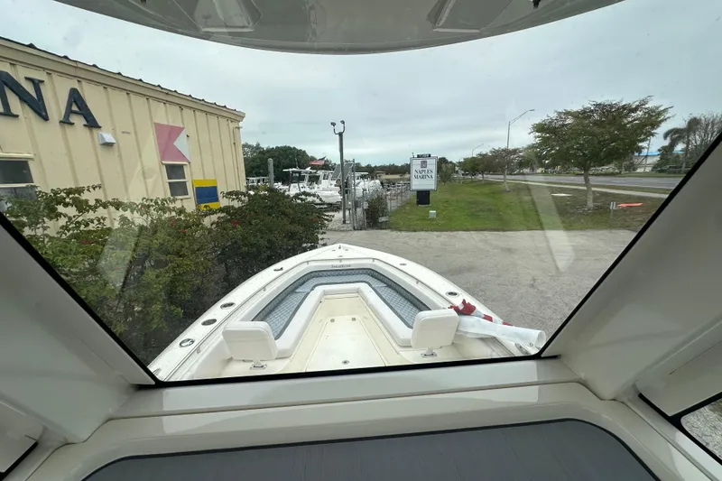 Slide: The Image of 2026 ShearWater 260 SS Carolina boat at Naples Marina, viewed from cockpit. - 16
