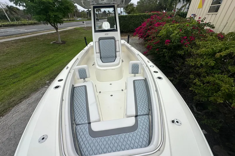 Slide: The Image of 2026 ShearWater 260 SS Carolina boat with cushioned seating and sleek design. - 20