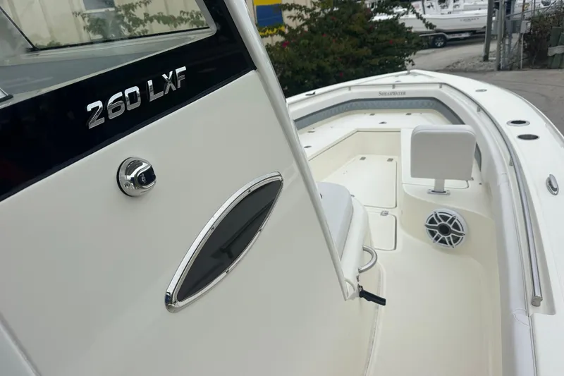 Slide: The Image of 2026 ShearWater 260 SS Carolina boat interior with seating and speaker detail. - 24