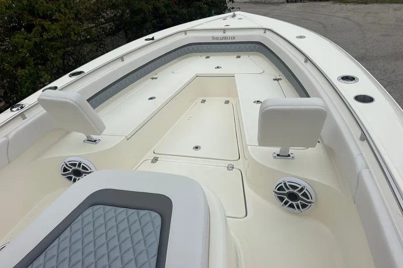 Slide: The Image of 2026 ShearWater 260 SS Carolina boat interior with seating and speakers. - 25