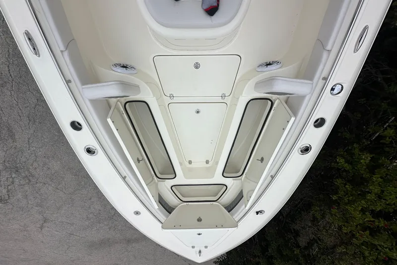 Slide: The Image of 2026 ShearWater 260 SS Carolina boat interior with storage compartments open. - 26