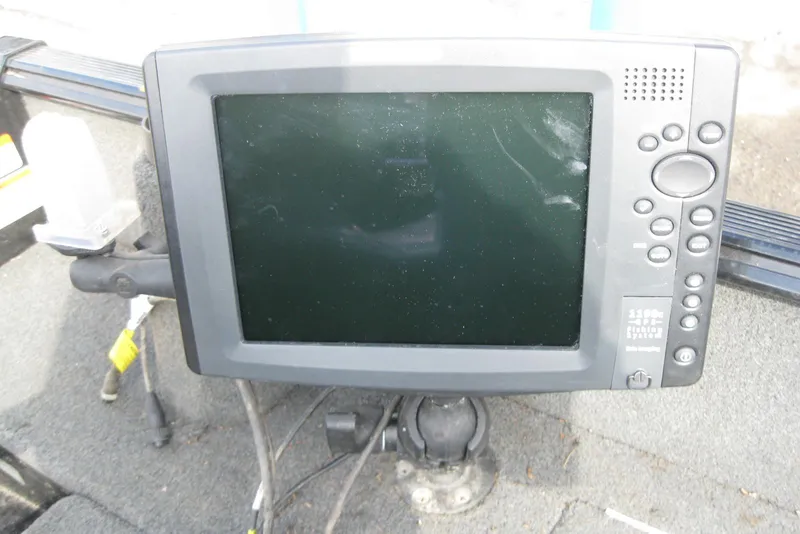 Slide: The Image of Fishfinder device on a 2015 Lund 1650 Rebel XL Tiller boat dashboard. - 11