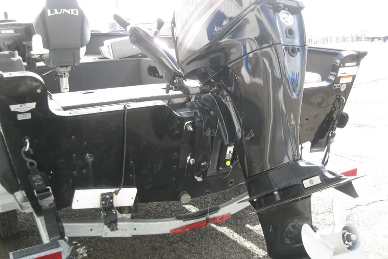 Slide: The Image of 2015 Lund 1650 Rebel XL Tiller boat with outboard motor, rear view. - 6