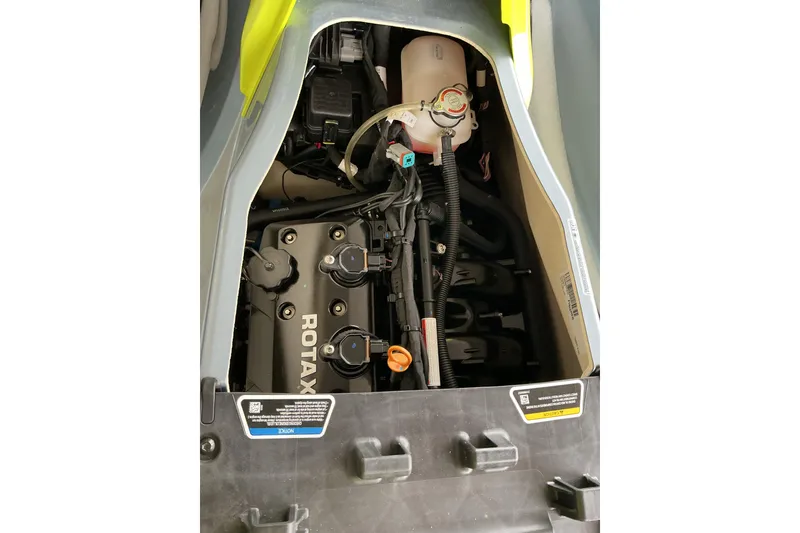 Slide: The Image of 2022 Sea-Doo GTI SE 170 engine compartment with Rotax engine visible. - 14