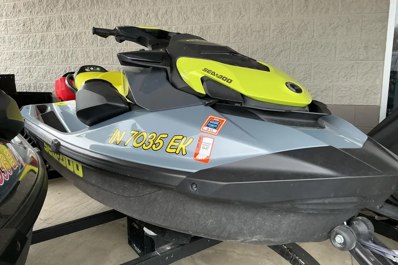 Slide: The Image of 2022 Sea-Doo GTI SE 170 jet ski in vibrant yellow and gray. - 3