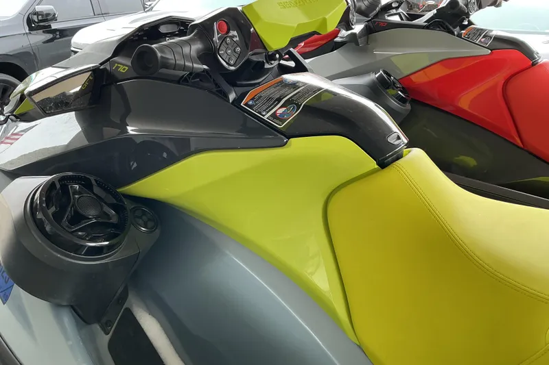 Slide: The Image of 2022 Sea-Doo GTI SE 170 jet ski with vibrant yellow and red seats. - 4