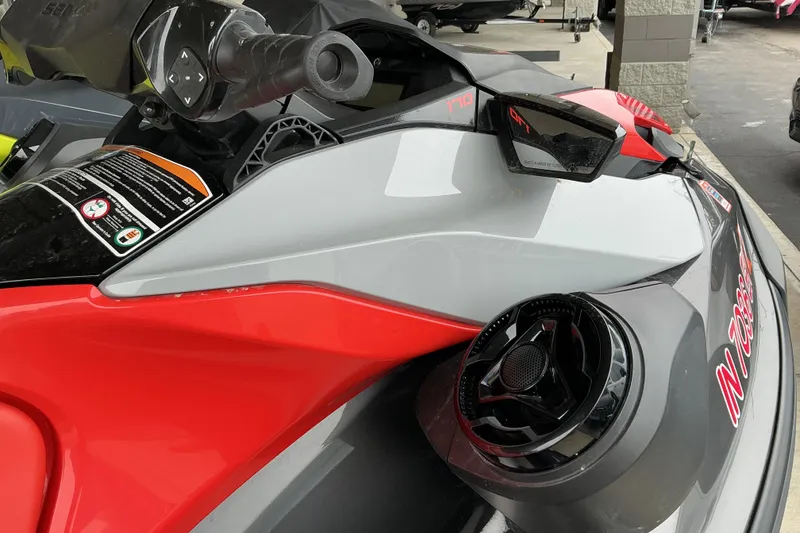 Slide: The Image of 2022 Sea-Doo GTI SE 170 jet ski, close-up of handlebars and speaker system. - 5