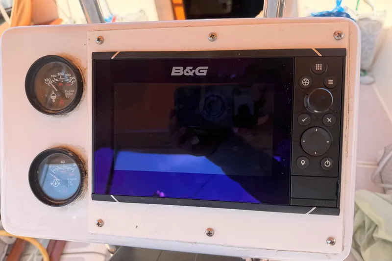 Slide: The Image of B&G navigation system on 1989 Island Packet Cutter sailboat dashboard. - 15
