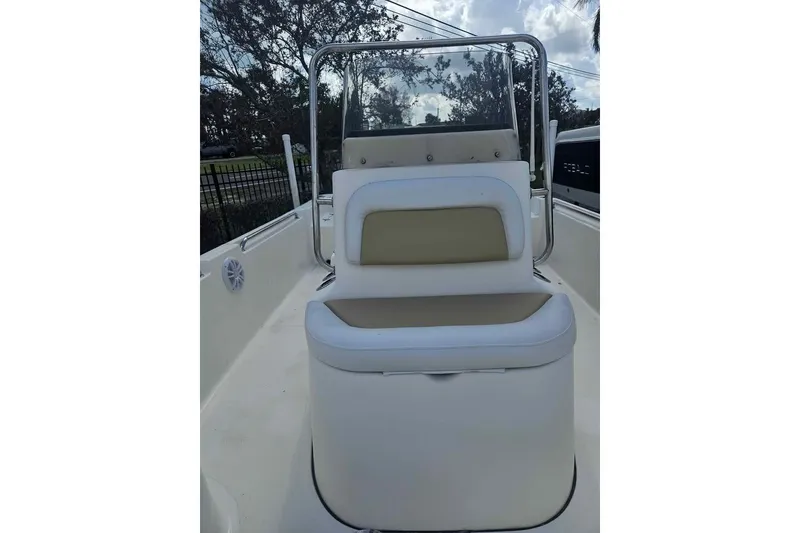 Slide: The Image of 2018 Bulls Bay 2000 boat interior with cushioned seating and console. - 12