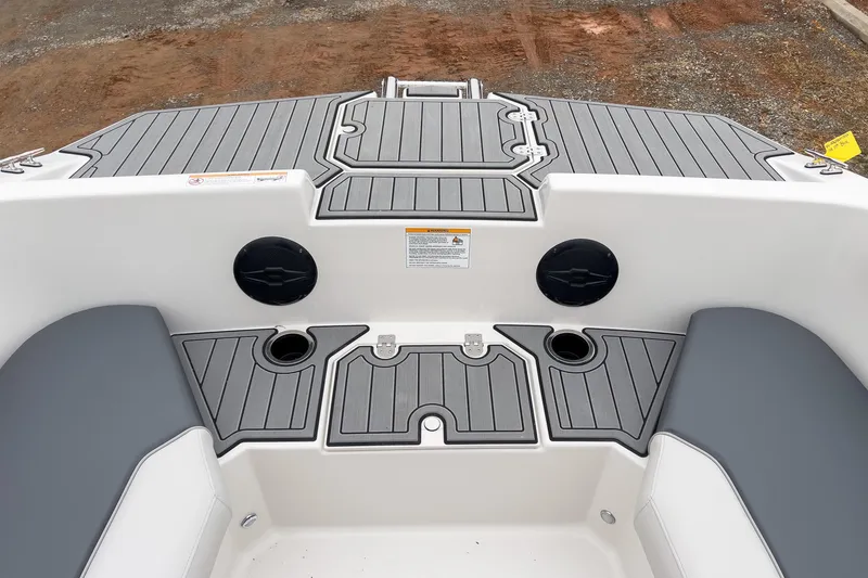 Slide: The Image of 2026 Starcraft SVX 171 OB boat interior with gray seating and deck. - 5