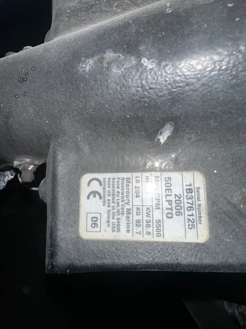 Slide: The Image of Close-up of 2006 Sylvan Mirage Cruise RE engine label. - 11