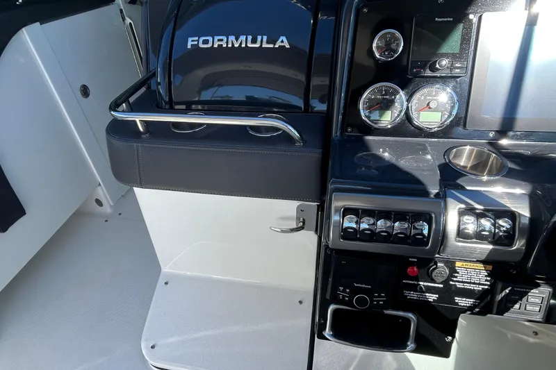 Slide: The Image of Control panel of a 2021 Formula 350 Crossover Bowrider I/O boat. - 10