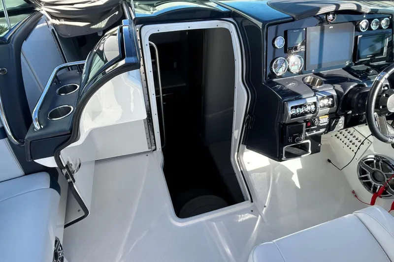 Slide: The Image of Interior cabin of 2021 Formula 350 Crossover Bowrider I/O with cozy bedding and modern design. - 18
