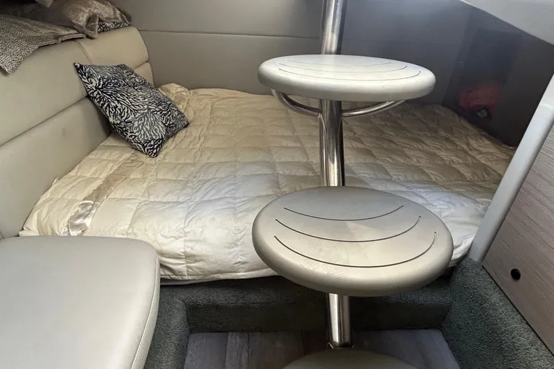 Slide: The Image of 2021 Formula 350 Crossover Bowrider I/O interior with microwave and storage cabinets. - 19