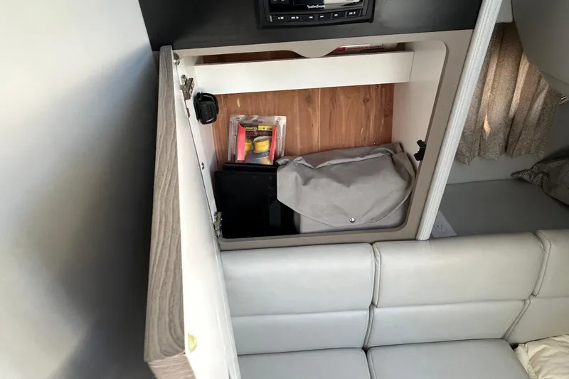 Slide: The Image of Interior of 2021 Formula 350 Crossover Bowrider I/O bathroom with sink and toilet. - 22