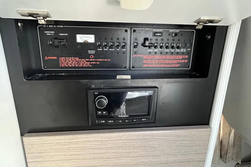 Slide: The Image of 2021 Formula 350 Crossover Bowrider I/O bathroom interior with toilet and sink. - 24