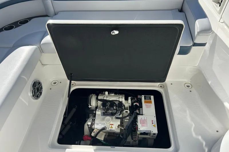 Slide: The Image of Engine compartment of a 2021 Formula 350 Crossover Bowrider I/O boat. - 27