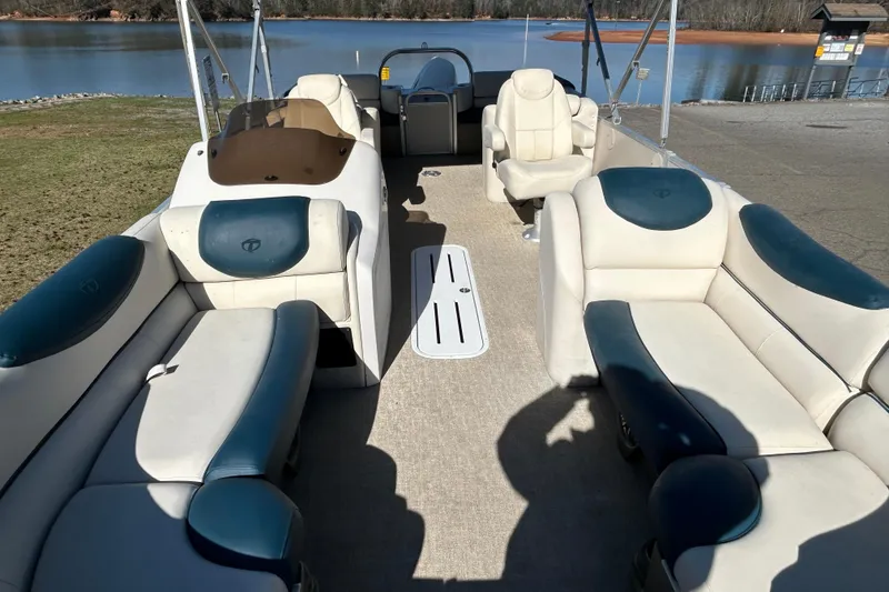 Slide: The Image of 2020 Tahoe Pontoon Cascade Platinum Quad Lounger 23' interior with lake view. - 18