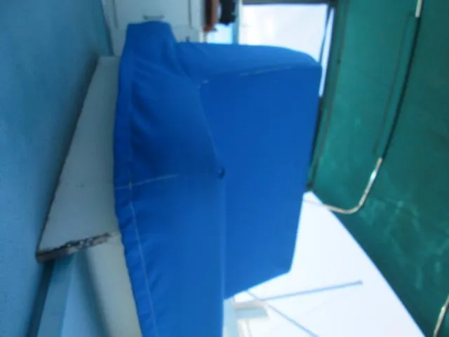 Slide: The Image of Blue seat on a 1976 Tollycraft 26 Sedan boat. - 22