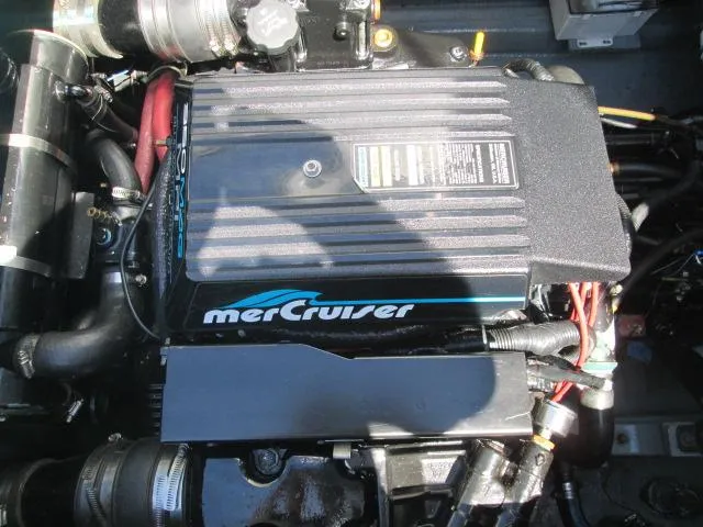 Slide: The Image of MerCruiser engine in a 1976 Tollycraft 26 Sedan boat. - 24