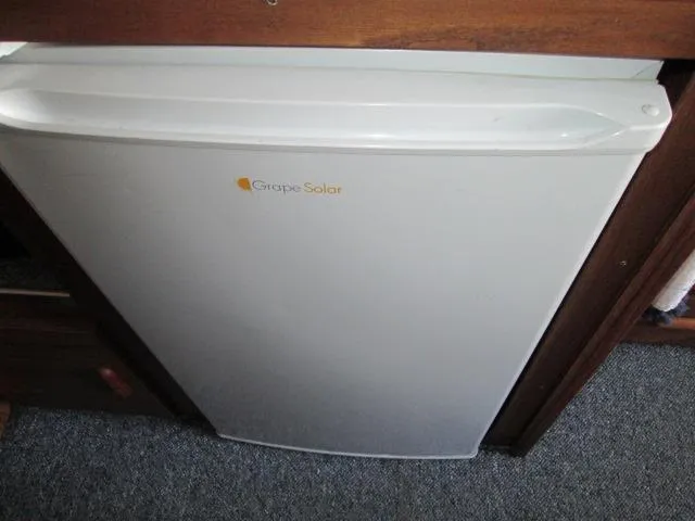 Slide: The Image of Grape Solar fridge in 1976 Tollycraft 26 Sedan boat. - 39