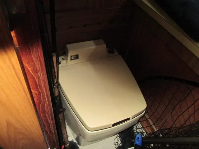 Slide: The Image of Interior of 1976 Tollycraft 26 Sedan with toilet. - 42