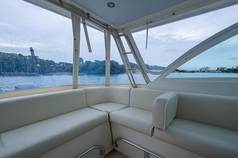 Slide: The Image of Interior view of 2019 Hunt Yachts Surfhunter 32 with scenic water backdrop. - 29