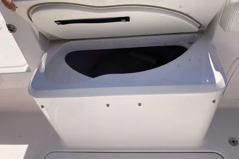 Slide: The Image of Open storage compartment on a 2005 Donzi 35 ZF Daytona boat. - 45