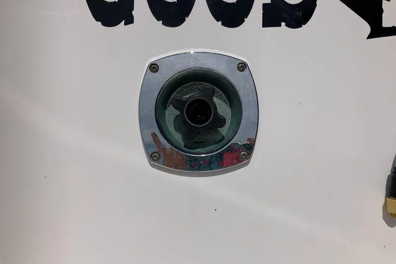 Slide: The Image of Fuel cap on a 2005 Donzi 35 ZF Daytona boat. - 49