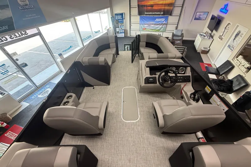 Slide: The Image of Modern 2026 Alera A 22 Q boat interior with plush seating and sleek dashboard. - 12