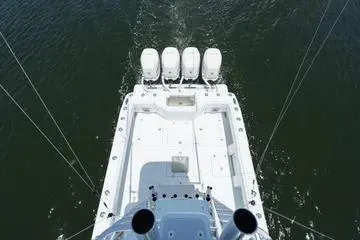 Slide: The Image of Overhead view of 2017 SeaVee 390Z boat with four engines on open water. - 9