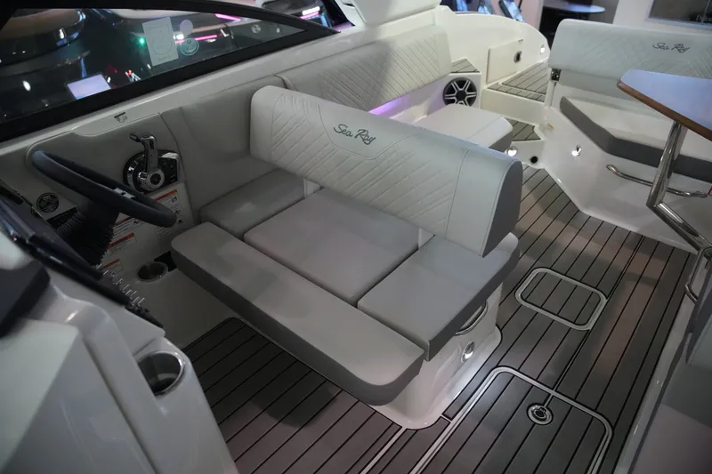 Slide: The Image of The image shows the interior of a 2026 Sea Ray SDX 270 boat with sleek seating and modern design. - 17