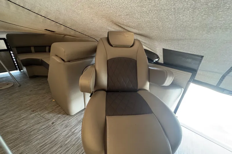 Slide: The Image of 2020 Bennington 22SSRXP boat interior with luxurious seating and modern design. - 16
