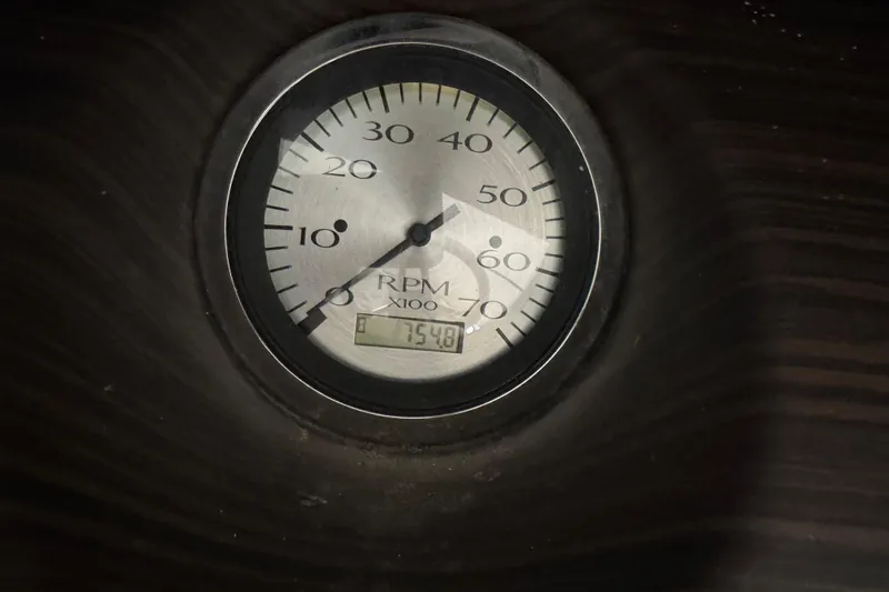 Slide: The Image of Close-up of a Bennington 22SSRXP 2020 RPM gauge displaying 7540 RPM. - 21