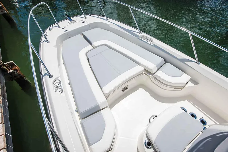 Slide: The Image of Manufacturer Provided Image: 2018 Boston Whaler 240 Dauntless boat with spacious seating and sleek design. - 10