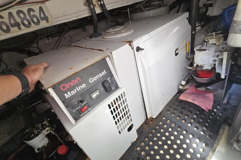 Slide: The Image of Engine room of 2007 Cruisers Yachts 447 Sport Sedan with Onan Marine Genset. - 22