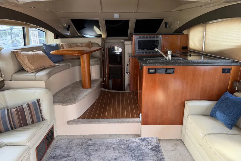 Slide: The Image of Luxurious interior of 2007 Cruisers Yachts 447 Sport Sedan with plush seating and modern amenities. - 30