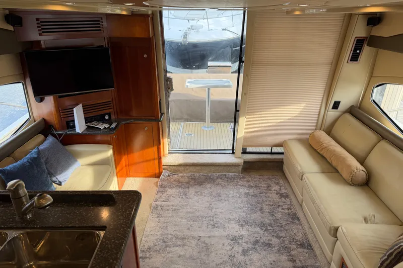 Slide: The Image of Luxurious interior of 2007 Cruisers Yachts 447 Sport Sedan with plush seating and modern amenities. - 37