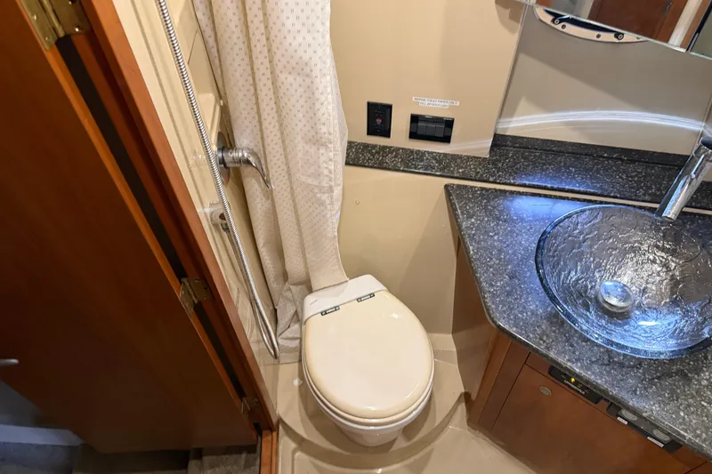 Slide: The Image of Luxurious bathroom in 2007 Cruisers Yachts 447 Sport Sedan with modern fixtures. - 43