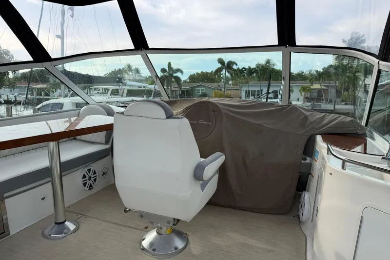 Slide: The Image of Interior view of 2007 Cruisers Yachts 447 Sport Sedan with covered helm and seating. - 49